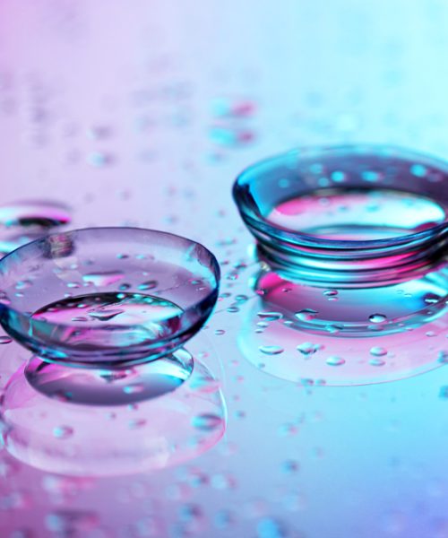 contact lenses, on pink-blue background